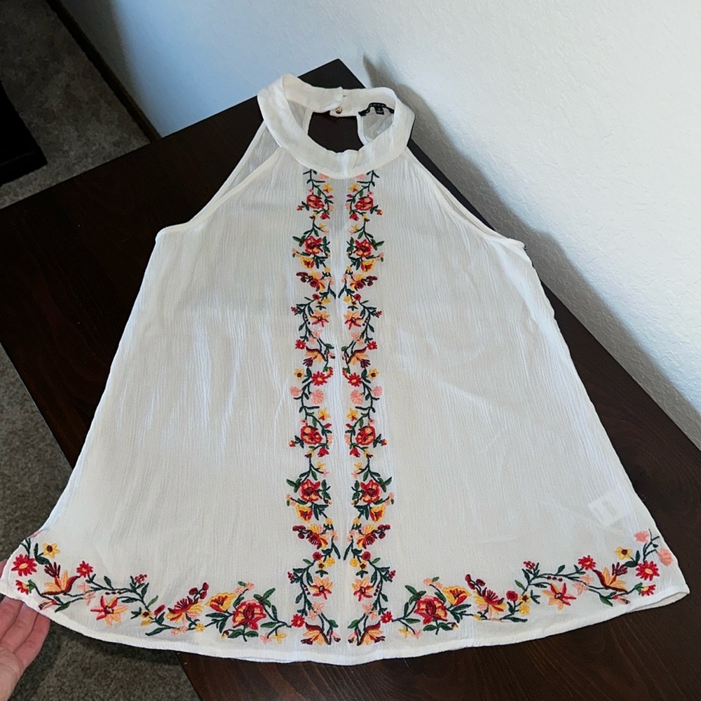 White embroidered gauzy sleeveless blouse w/red, orange & yellow flowers
